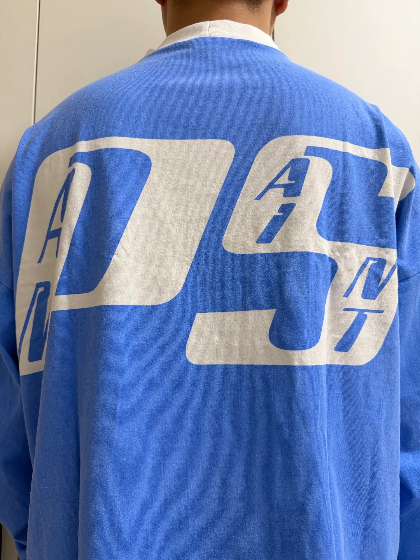 SAINT Mxxxxx Make the printing look distressed and white. Correct accessories. Customized co-branded model with P.A.M. wash mark.